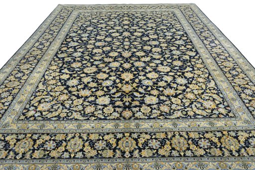 Surface texture of 2000s Kashan rug with natural Wool and intricate pattern