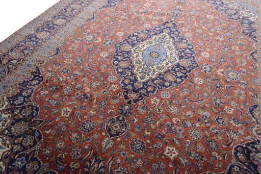 Backside of handmade New Kashan rug showing knot structure and weave density