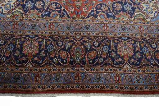 Full view of New Kashan rug from Iran / Persia, 403 × 292 cm in Red tones