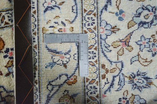 Close-up detail of 2000s Kashan rug from Iran / Persia showing Wool weave