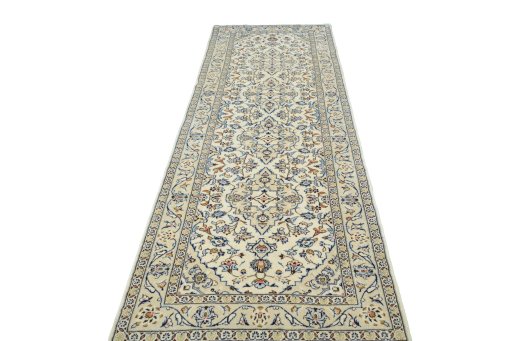 Surface texture of 2000s Kashan rug with natural Wool and intricate pattern