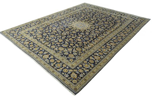 Corner detail of 2000s Kashan rug showing border pattern and Wool pile