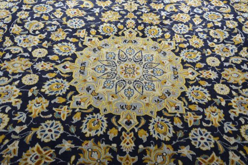 Central medallion detail of 2000s Kashan rug from Iran / Persia