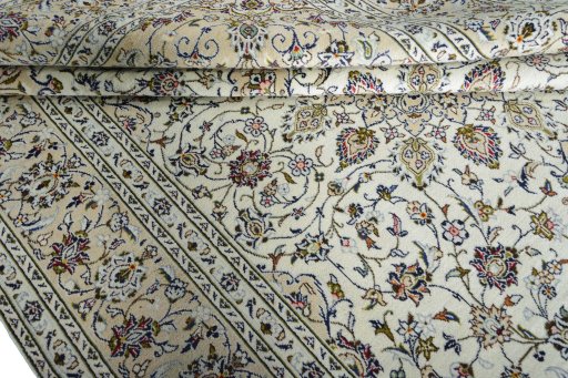 Close-up detail of 2000s Kashan rug from Iran / Persia showing Wool weave