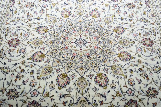 Central medallion detail of 2000s Kashan rug from Iran / Persia