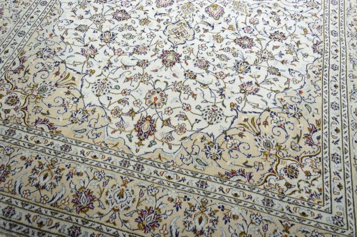 Close-up detail of 2000s Kashan rug from Iran / Persia showing Wool weave