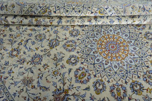 Close-up detail of 2000s Kashan rug from Iran / Persia showing Wool weave