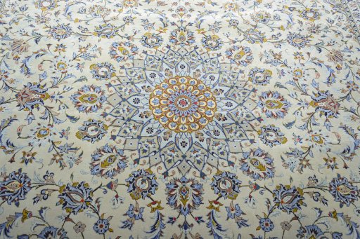 Central medallion detail of 2000s Kashan rug from Iran / Persia