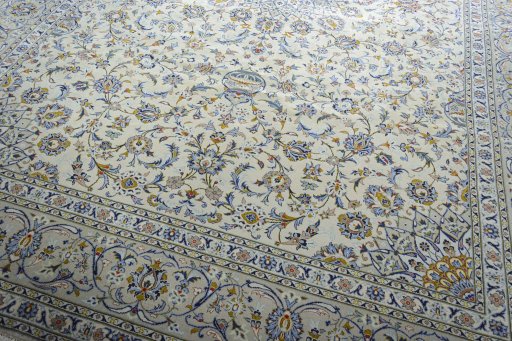 Close-up detail of 2000s Kashan rug from Iran / Persia showing Wool weave