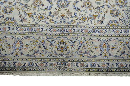 Full view of 2000s Kashan rug from Iran / Persia, 413 × 297 cm in Beige tones