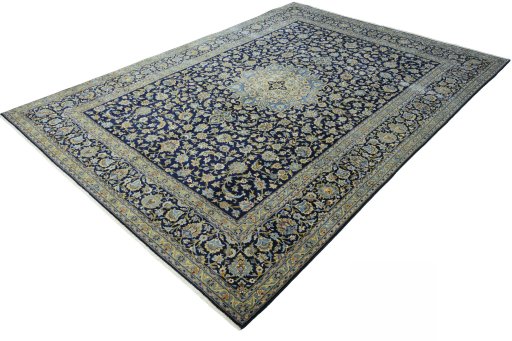 Corner detail of 2000s Kashan rug showing border pattern and Wool pile