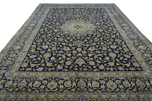 Surface texture of 2000s Kashan rug with natural Wool and intricate pattern