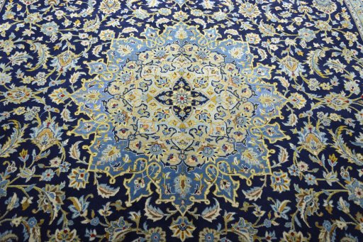 Central medallion detail of 2000s Kashan rug from Iran / Persia