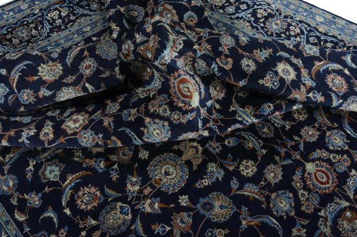 Surface texture of 2000s Kashan rug with natural Wool and intricate pattern