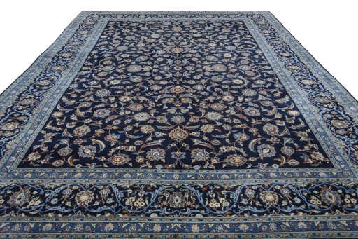 Surface texture of 2000s Kashan rug with natural Wool and intricate pattern