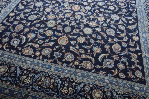Close-up detail of 2000s Kashan rug from Iran / Persia showing Wool weave
