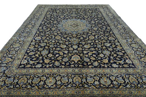 Surface texture of 2000s Kashan rug with natural Wool and intricate pattern