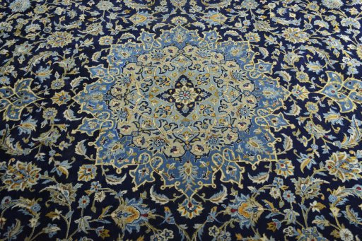 Central medallion detail of 2000s Kashan rug from Iran / Persia