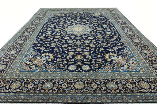 Surface texture of 2000s Kashan rug with natural Wool and intricate pattern