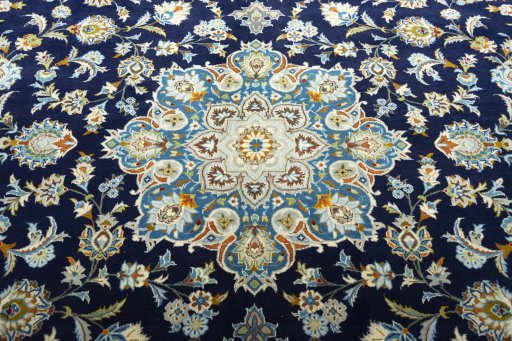 Central medallion detail of 2000s Kashan rug from Iran / Persia