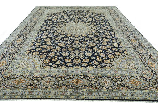 Surface texture of 2000s Kashan rug with natural Wool and intricate pattern