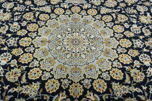 Central medallion detail of 2000s Kashan rug from Iran / Persia