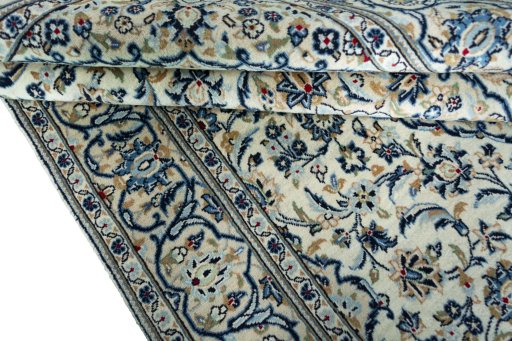 Close-up detail of 2000s Kashan rug from Iran / Persia showing Wool weave