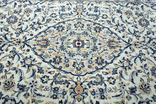 Central medallion detail of 2000s Kashan rug from Iran / Persia