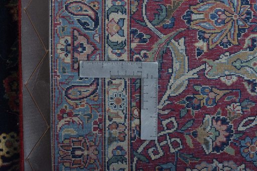 Surface texture of 1930s Kashan rug with natural Wool and intricate pattern
