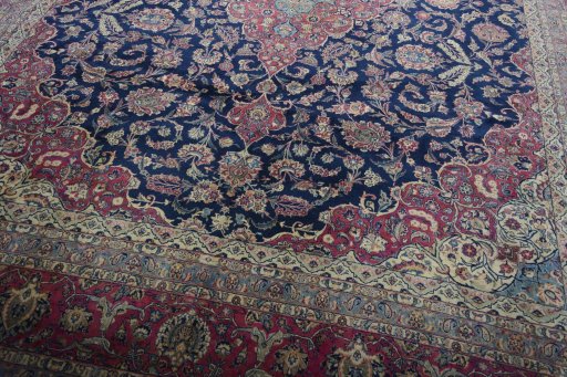 Close-up detail of 1930s Kashan rug from Iran / Persia showing Wool weave