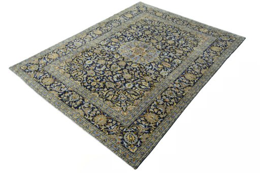 Corner detail of 2000s Kashan rug showing border pattern and Wool pile