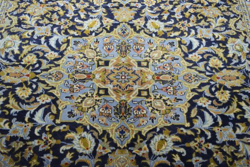 Central medallion detail of 2000s Kashan rug from Iran / Persia