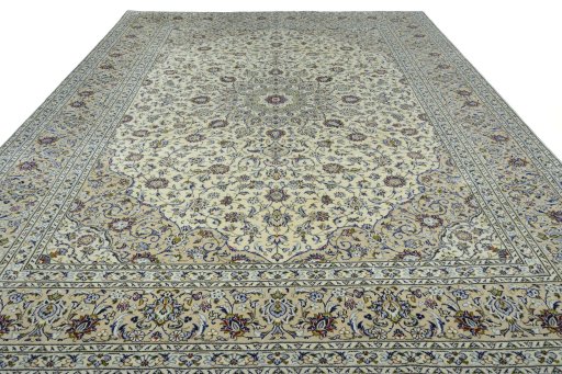 Surface texture of 2000s Kashan rug with natural Wool and intricate pattern