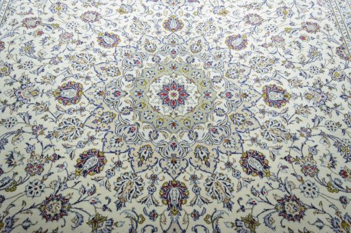 Central medallion detail of 2000s Kashan rug from Iran / Persia
