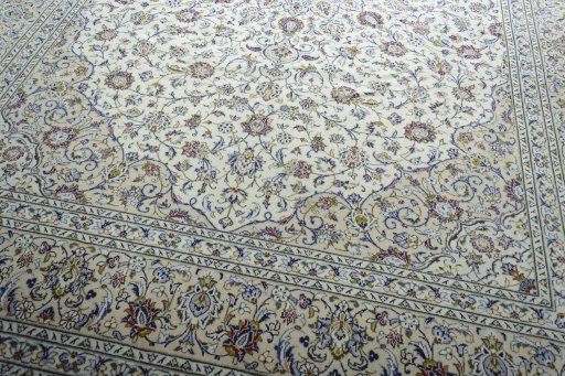 Close-up detail of 2000s Kashan rug from Iran / Persia showing Wool weave