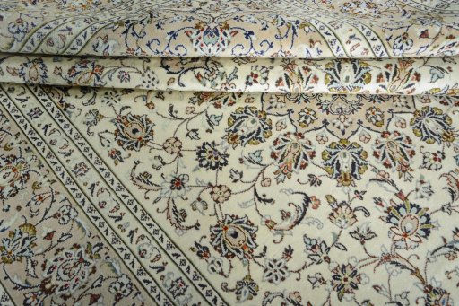 Close-up detail of 2000s Kashan rug from Iran / Persia showing Wool weave