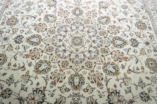 Central medallion detail of 2000s Kashan rug from Iran / Persia