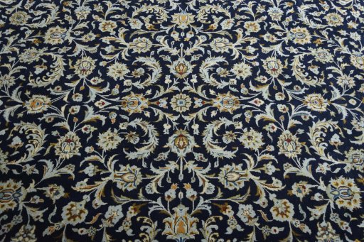 Central medallion detail of 2000s Kashan rug from Iran / Persia