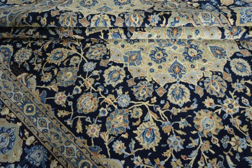 Close-up detail of 2000s Kashan rug from Iran / Persia showing Wool weave