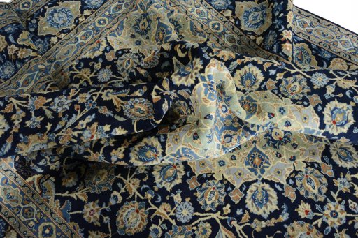 Surface texture of 2000s Kashan rug with natural Wool and intricate pattern