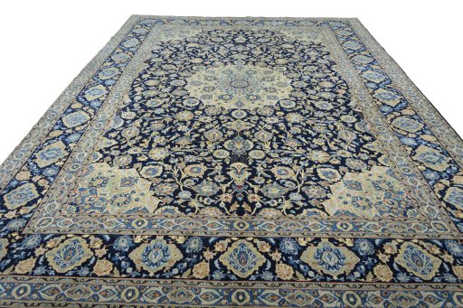 Surface texture of 2000s Kashan rug with natural Wool and intricate pattern