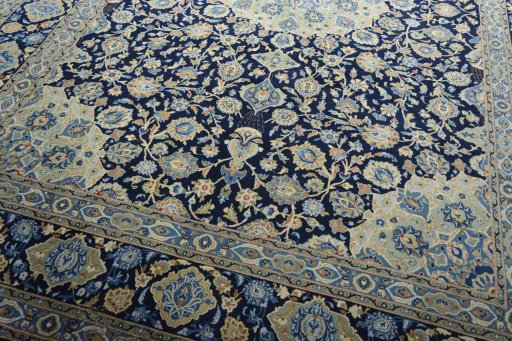 Close-up detail of 2000s Kashan rug from Iran / Persia showing Wool weave