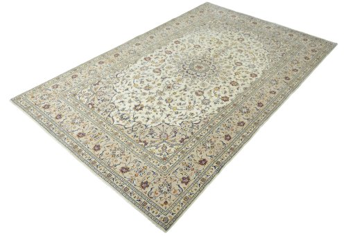 Corner detail of 2000s Kashan rug showing border pattern and Wool pile