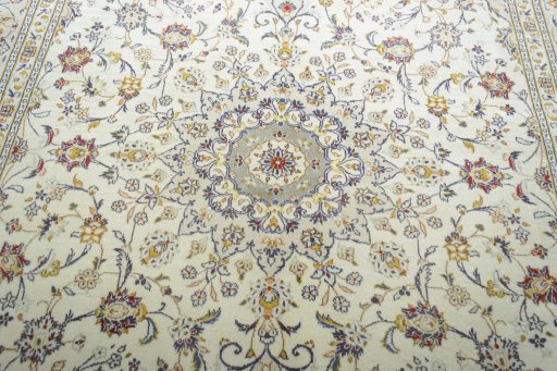 Central medallion detail of 2000s Kashan rug from Iran / Persia