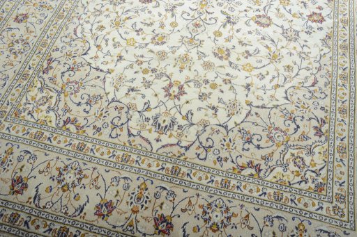 Close-up detail of 2000s Kashan rug from Iran / Persia showing Wool weave