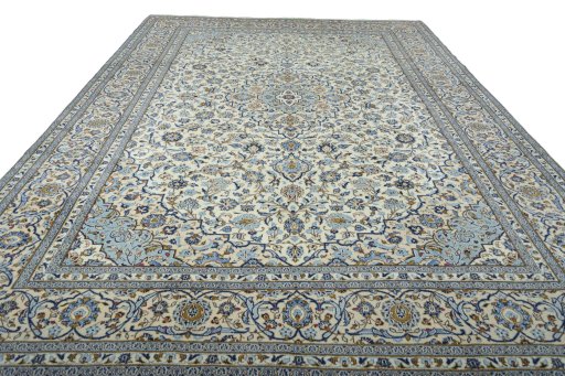 Surface texture of 2000s Kashan rug with natural Wool and intricate pattern