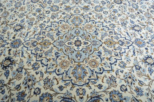 Central medallion detail of 2000s Kashan rug from Iran / Persia