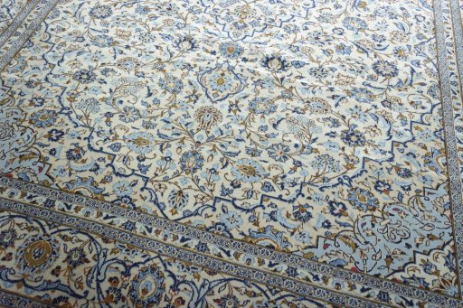 Close-up detail of 2000s Kashan rug from Iran / Persia showing Wool weave