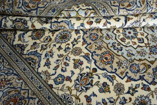 Close-up detail of 2000s Kashan rug from Iran / Persia showing Wool weave