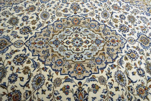 Central medallion detail of 2000s Kashan rug from Iran / Persia